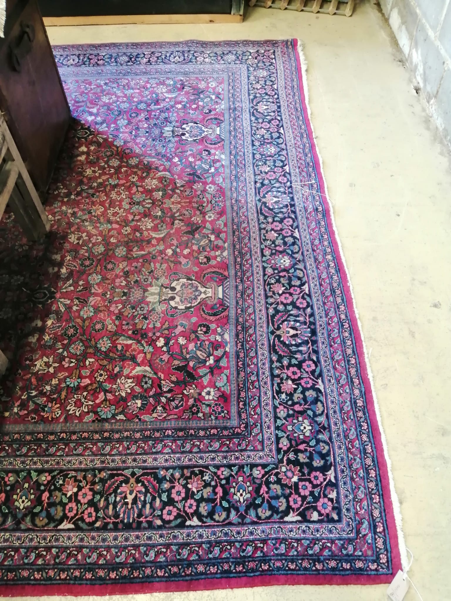 A North West Persian burgundy ground carpet, 364 x 260cm